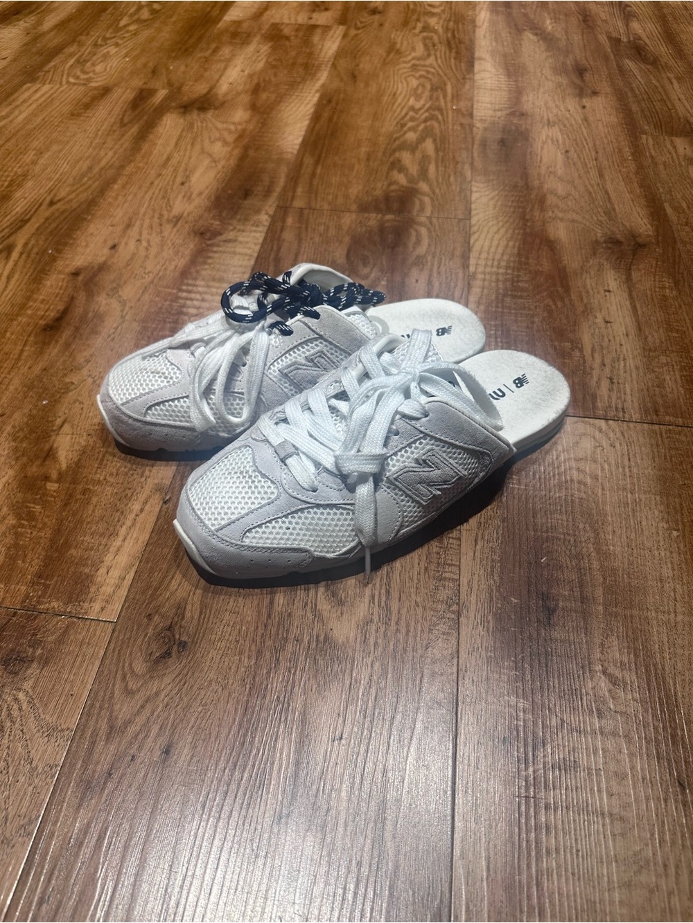 White & gray logo branded sneaker mules